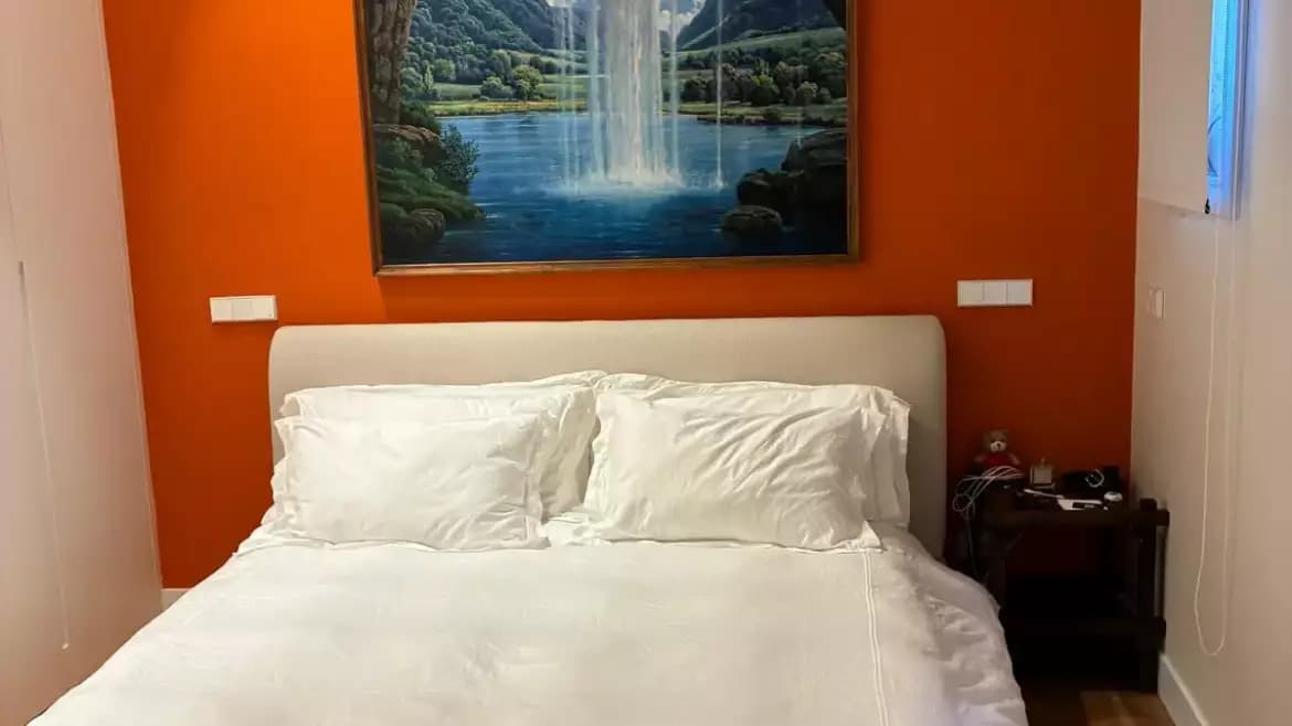 Bedroom with upholstered headboard, Madrid Salamanca residence